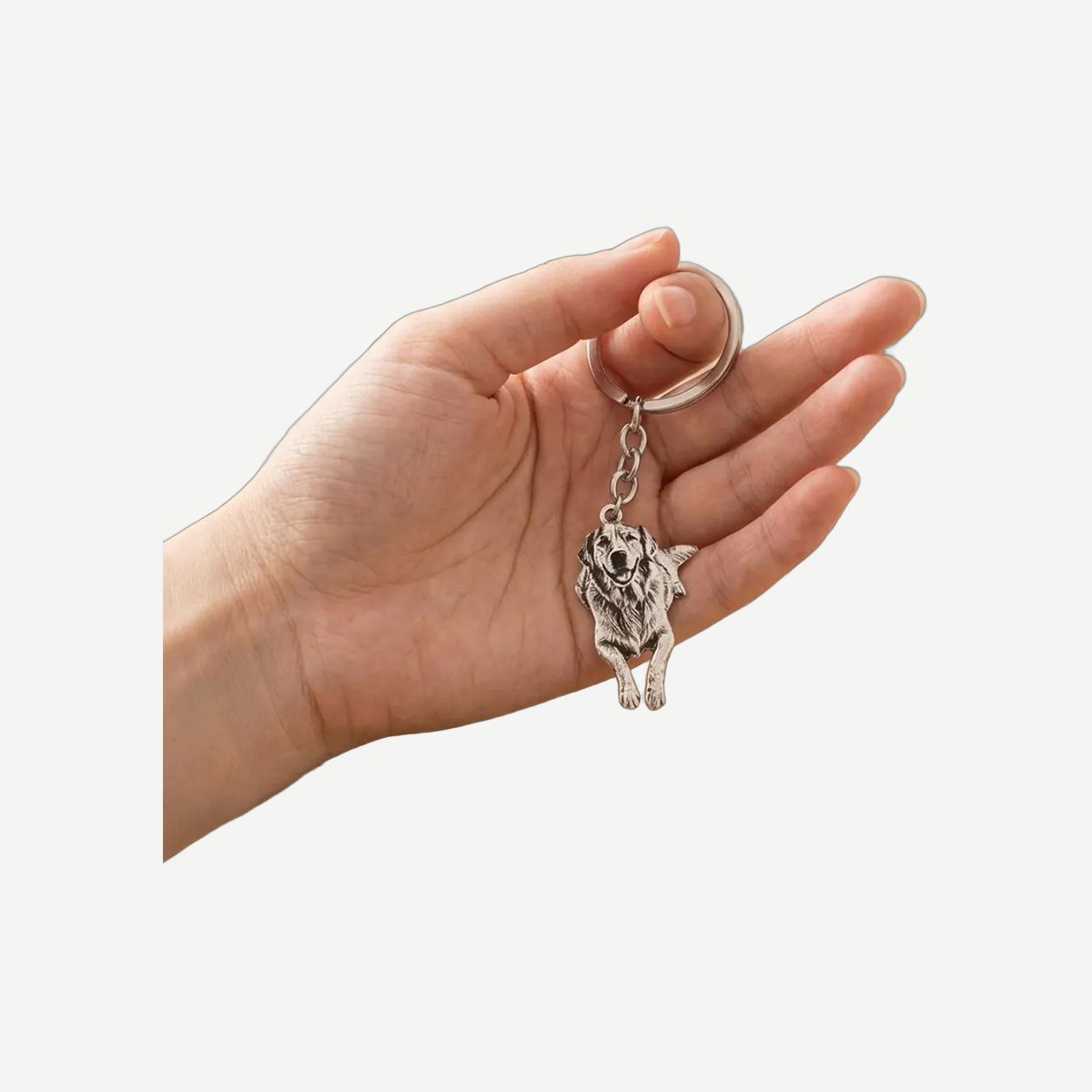 Metalen sleutelhanger met gegraveerde hondenfoto