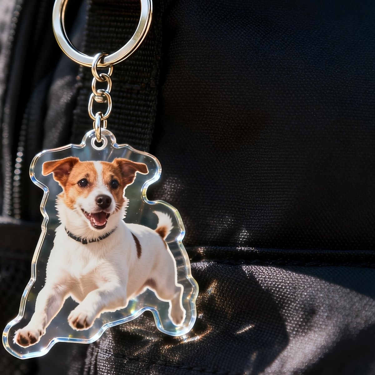 Sleutelhanger puppy aan een rugzak